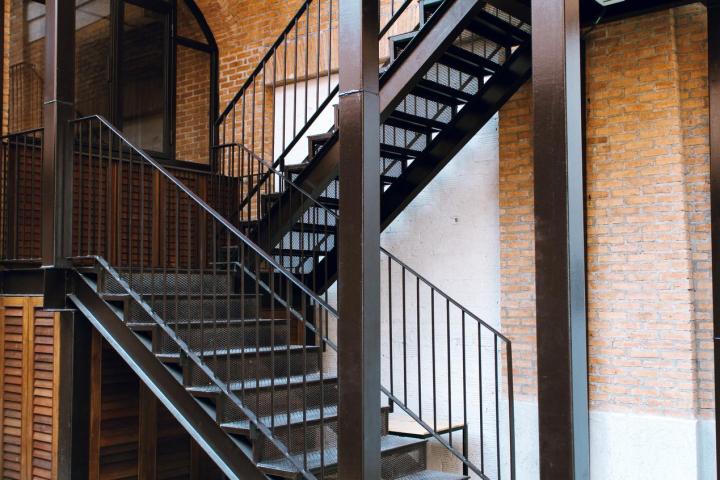 Industrial steel staircase in a brick building
